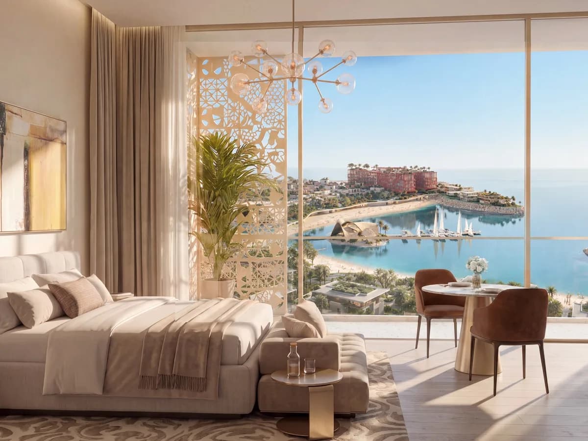 Render of a furnished bedroom with a floor-to-ceiling window overlooking the bay, marina and red hotel buildings