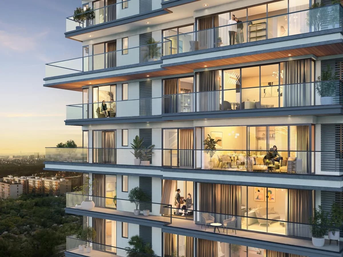 Artist's impression of a tower facade at dusk with stretched glass balconies and full-height windows
